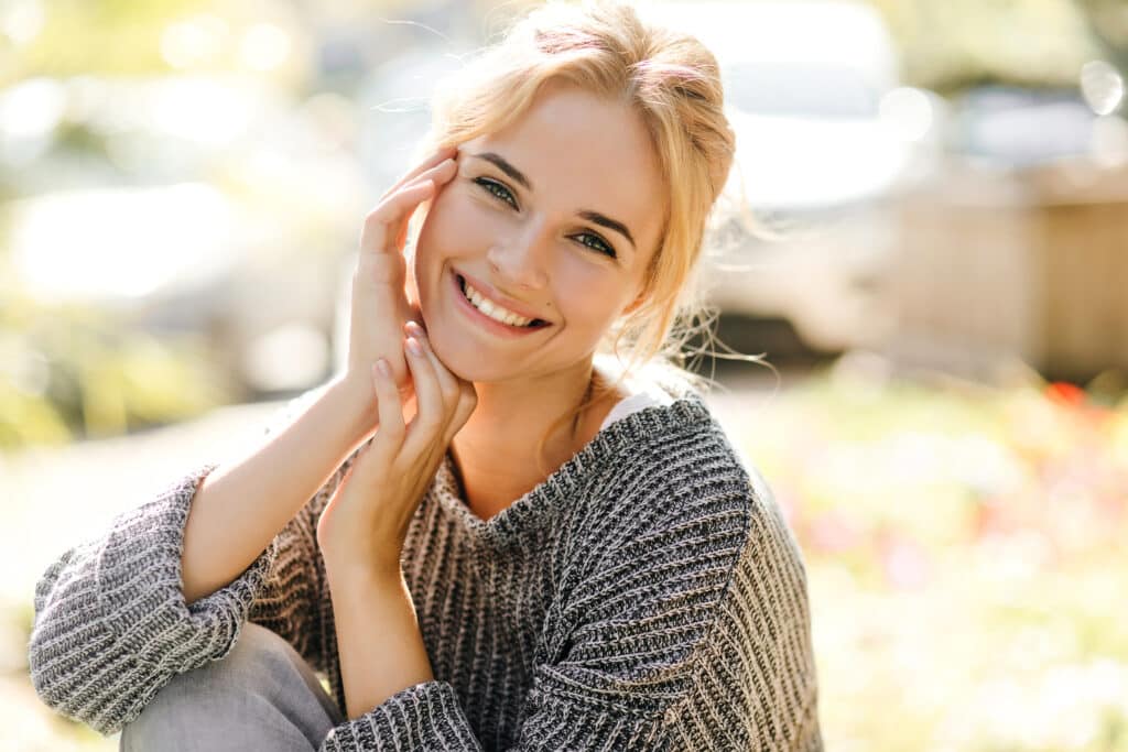 Positive,Woman,With,Charming,Smile,Looks,Into,Camera.,Girl,In