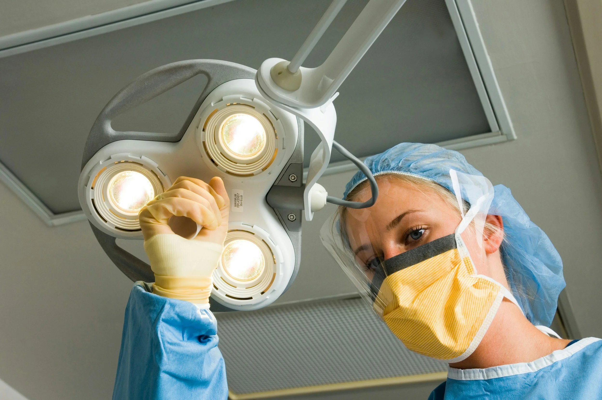 Dentist preparing to perform a dental implant procedure.